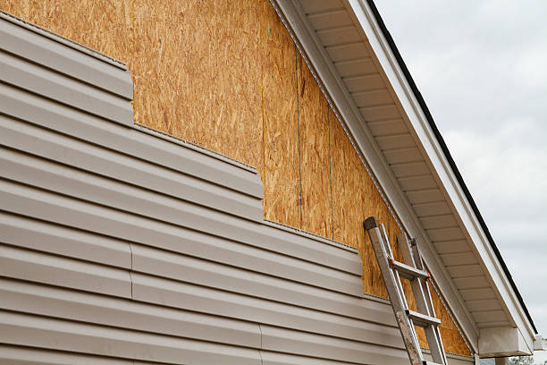 Professional Emergency Siding Repair technician working in Harrison, TN
